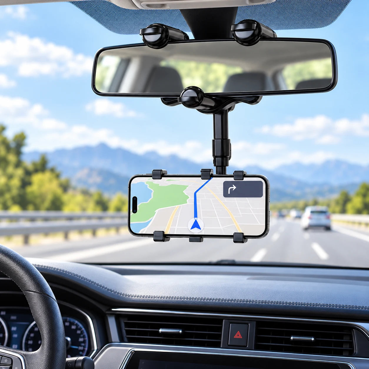 MirrorReach installed below a car rearview mirror without dashboard tape or windshield suction cup